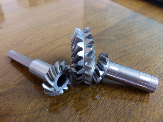 8 Double-sided Spiral Bevel Gears With Hyperbolic Surface Design For Enhanced Load-bearing Capacity